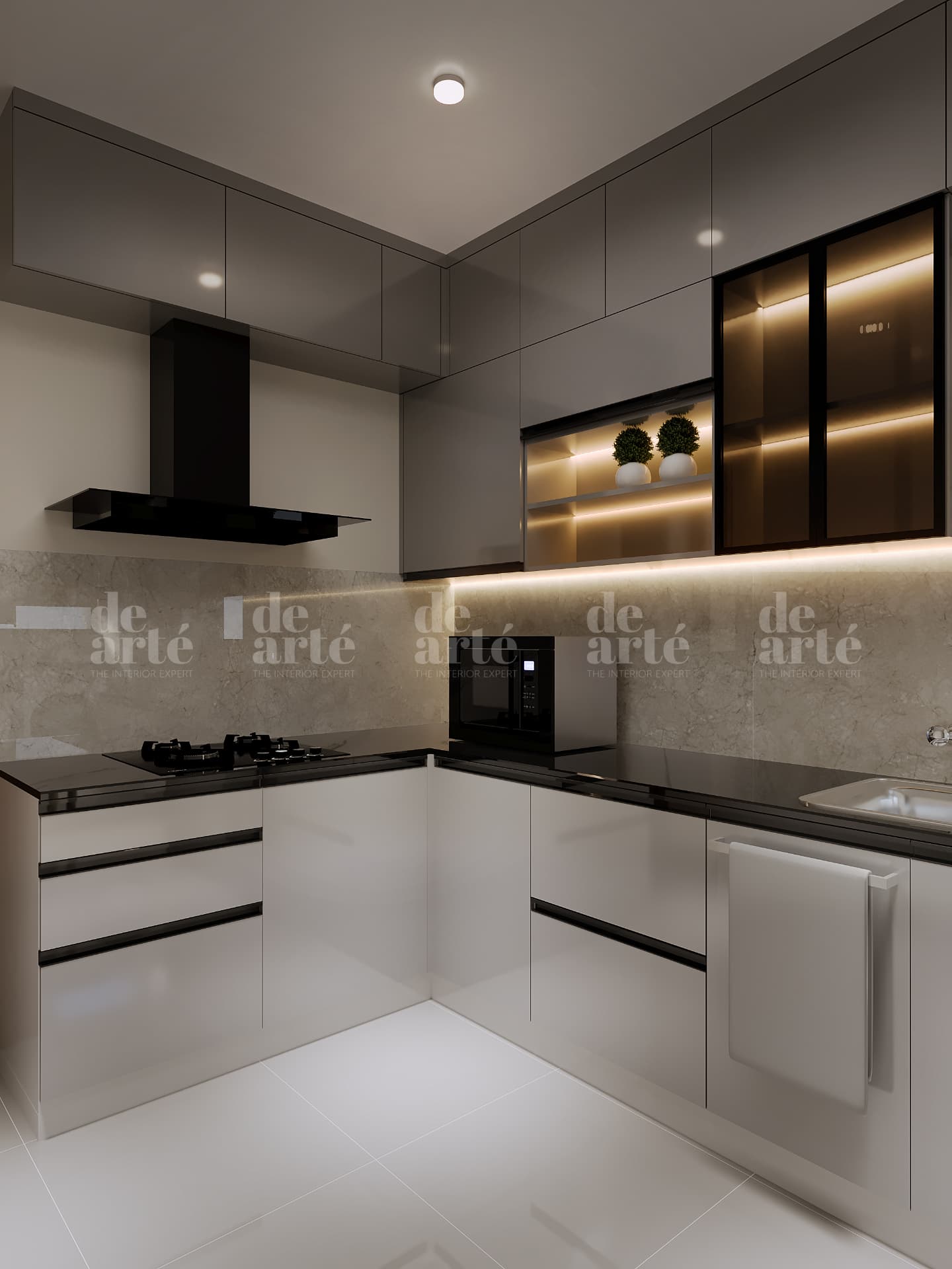 Nikitha project in Trivandrum — modern kitchen with black counters and white cabinetry